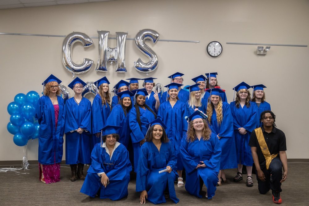 Picture of the 2022 graduating class wearing their caps and gowns.