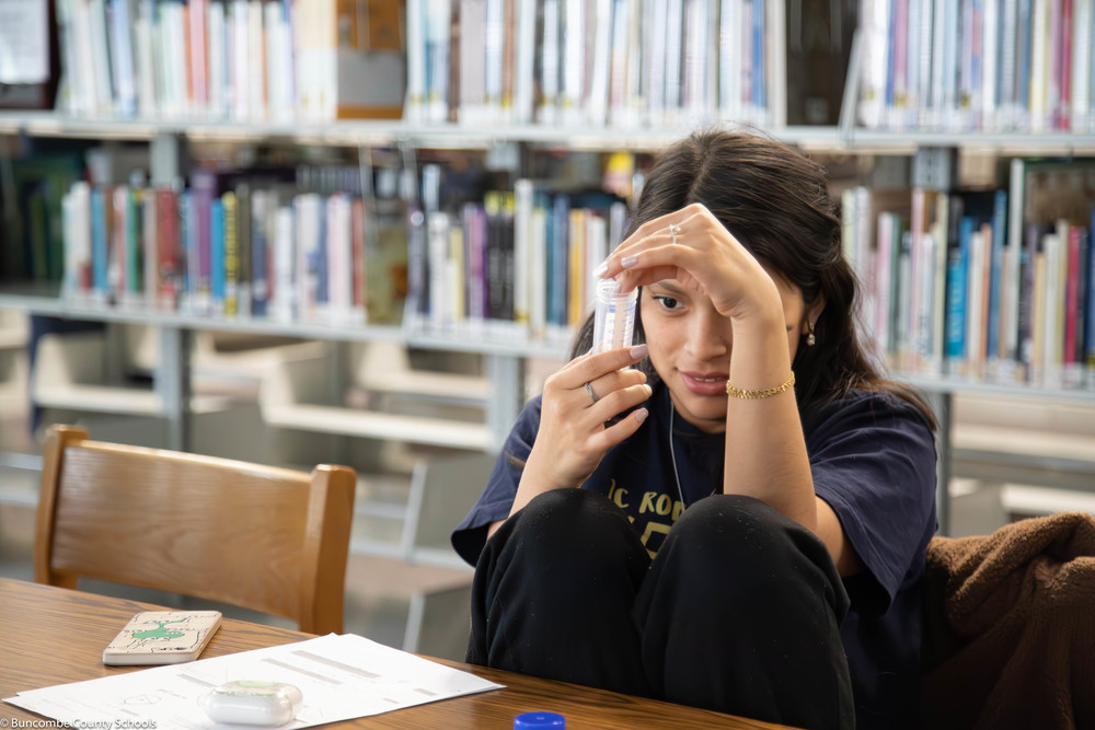 Student participating in a DNA lab