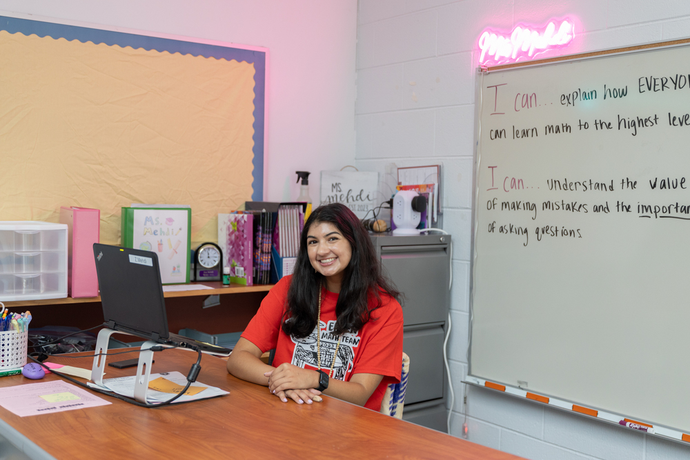 Teacher Zoe Mehdi at her desk