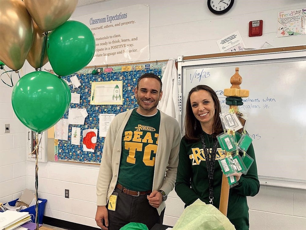 Photo of Principal Alexander and Teacher of the Year Maura Brouwer smiling in her classroom