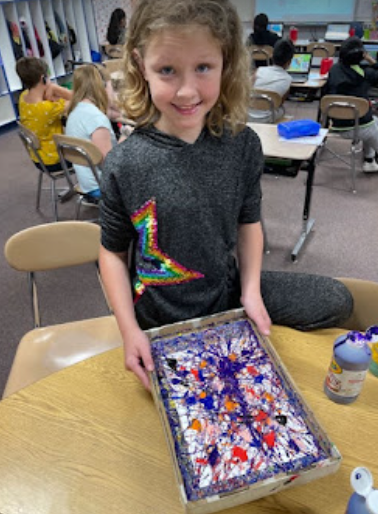 Students create paintings inspired by Jackson Pollock