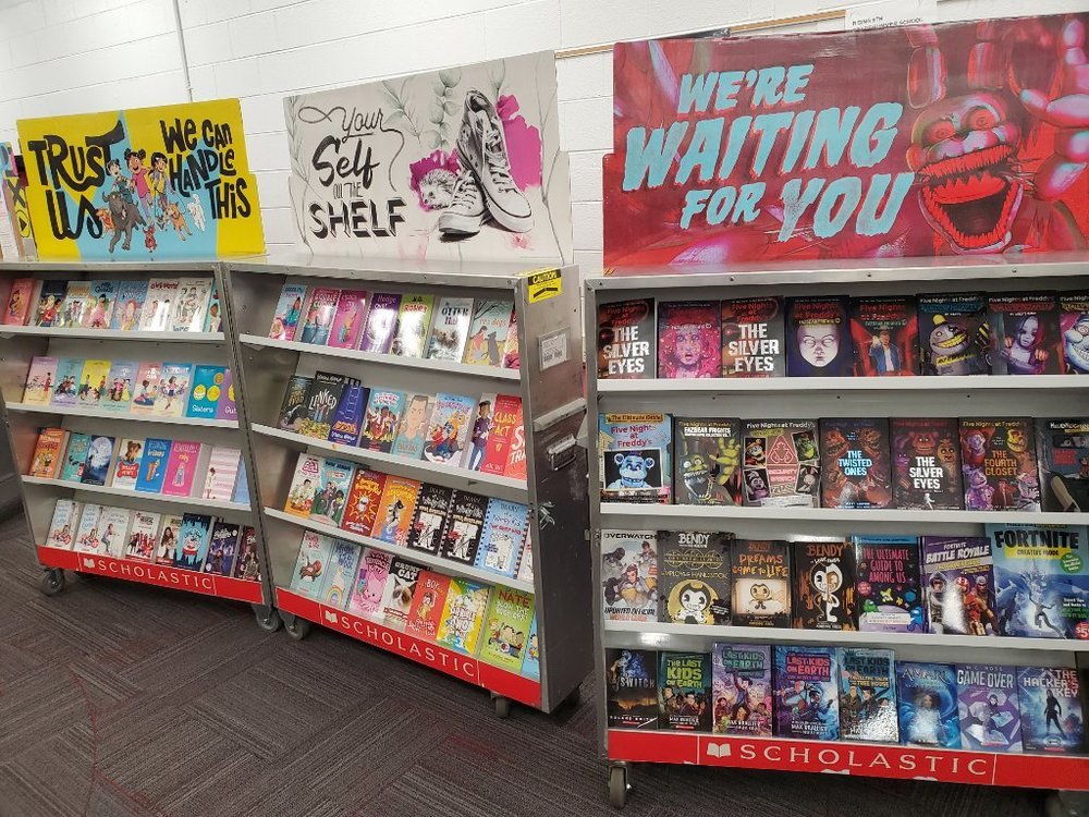 Scholastic books displayed on shelves