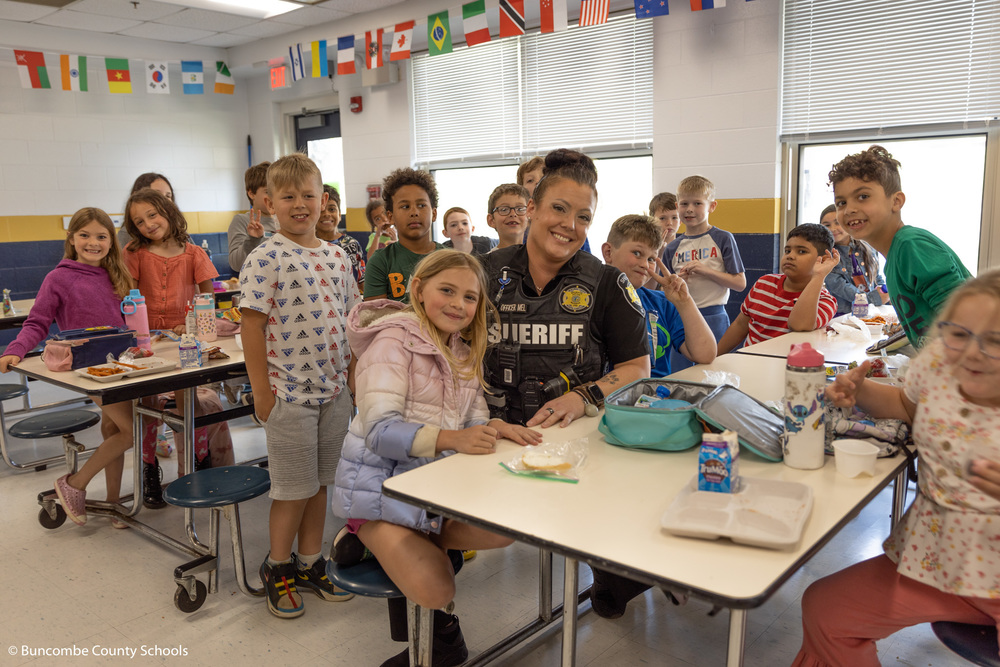 Officer Mel with a group of students at Glen Arden Elementary