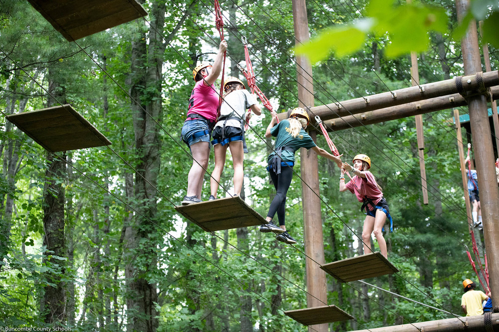 Students working as a team on the ropes course at the YMCA Blue Ridge Assembly
