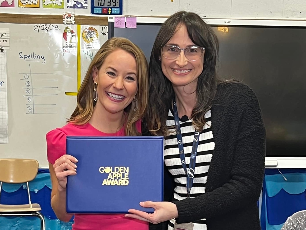 Mrs. Oramas with her award