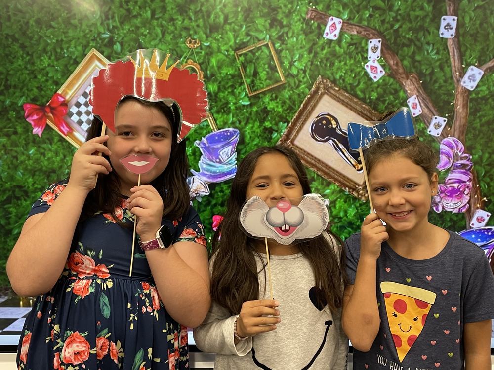 Dual Language NB third graders dress up for Mad Hatter party