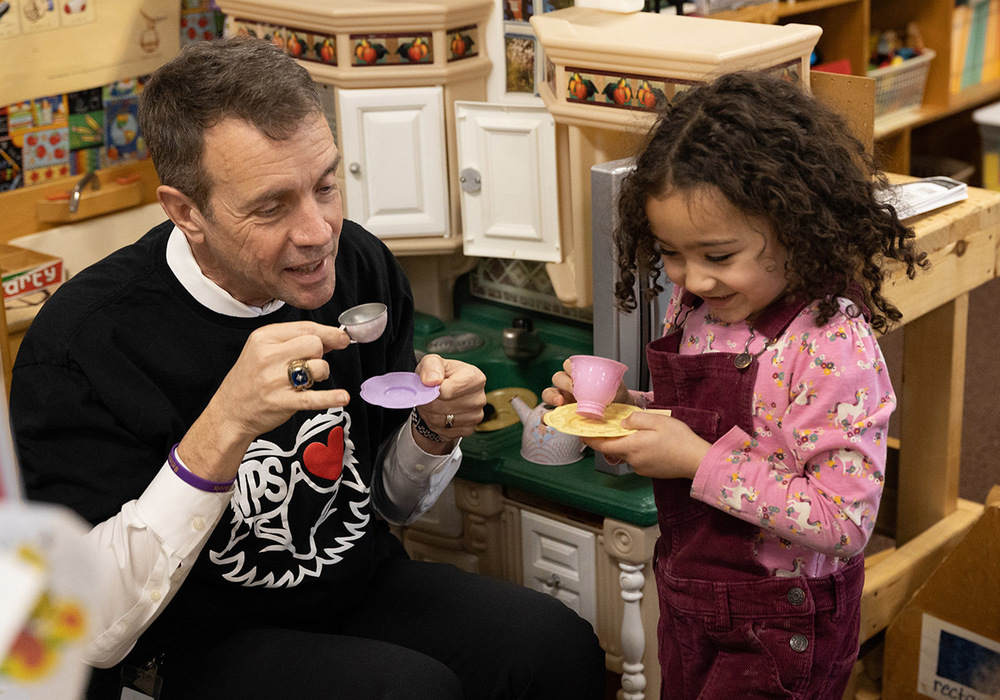 Dr Jackson playing tea time with a K student