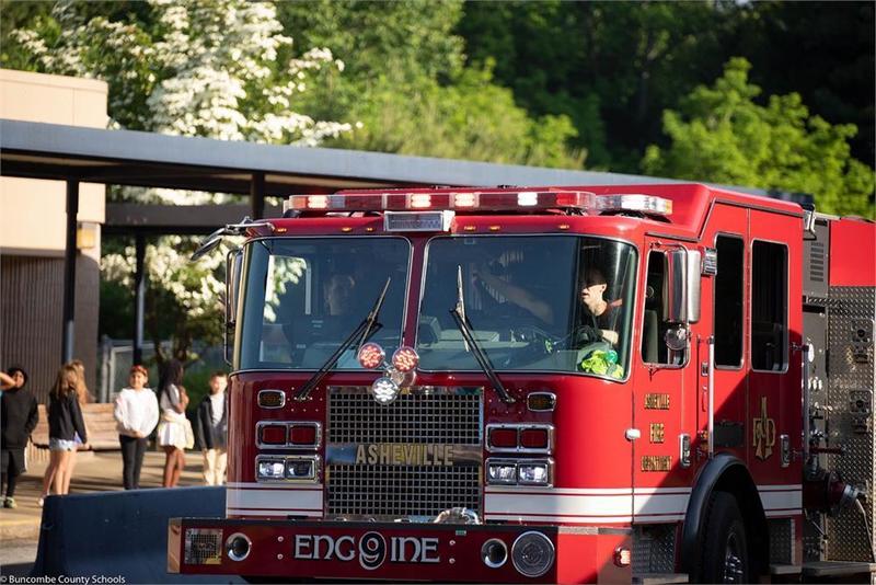 Fire truck parked in front of school