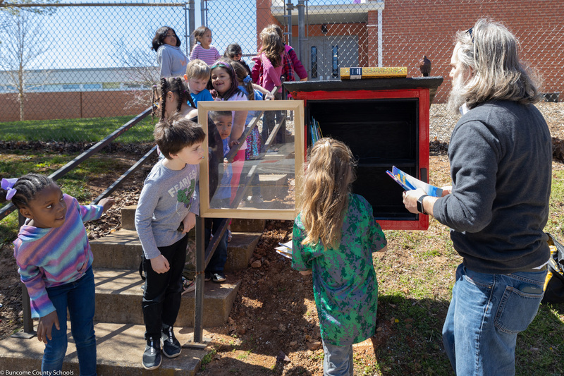 Students inspect new Little Library