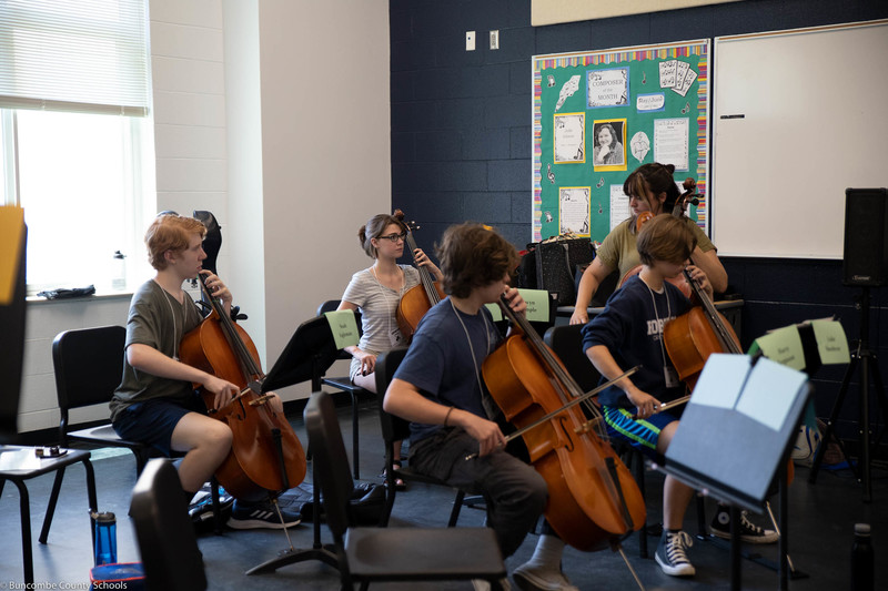 Students working on musical skills at the second annual Strings Summer Bash Camp.