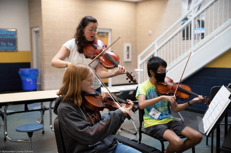 Students working on musical skills at the second annual Strings Summer Bash Camp.