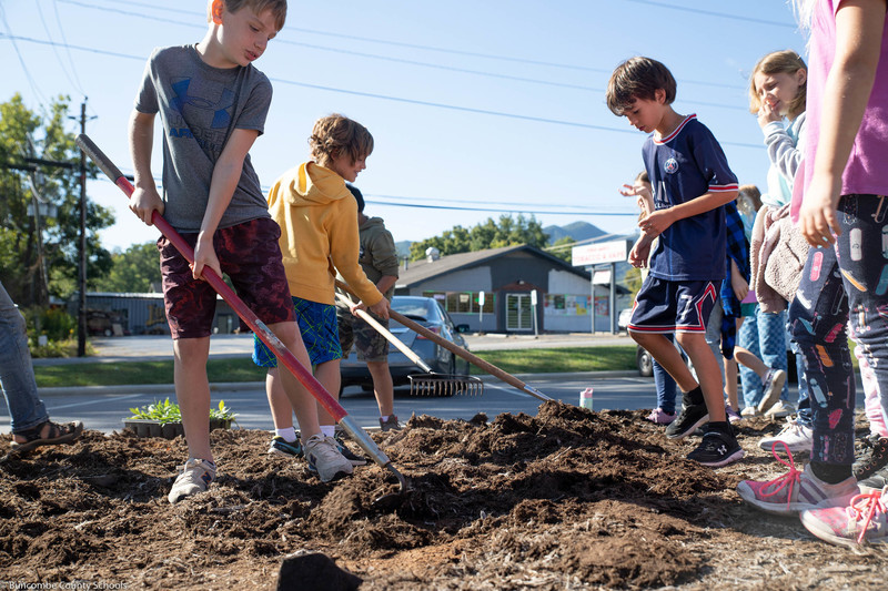 Students working on the building of the pollinator garden.