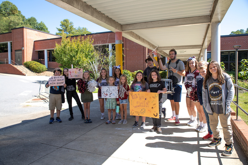 Owen drumline and cheerleaders outside W.D. Williams Elementary