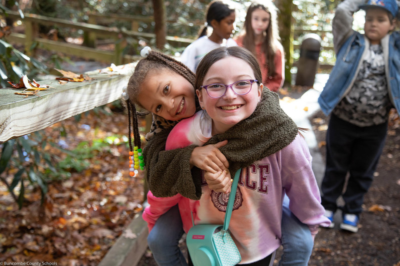 Students walking the trail at the Oconaluftee Village.