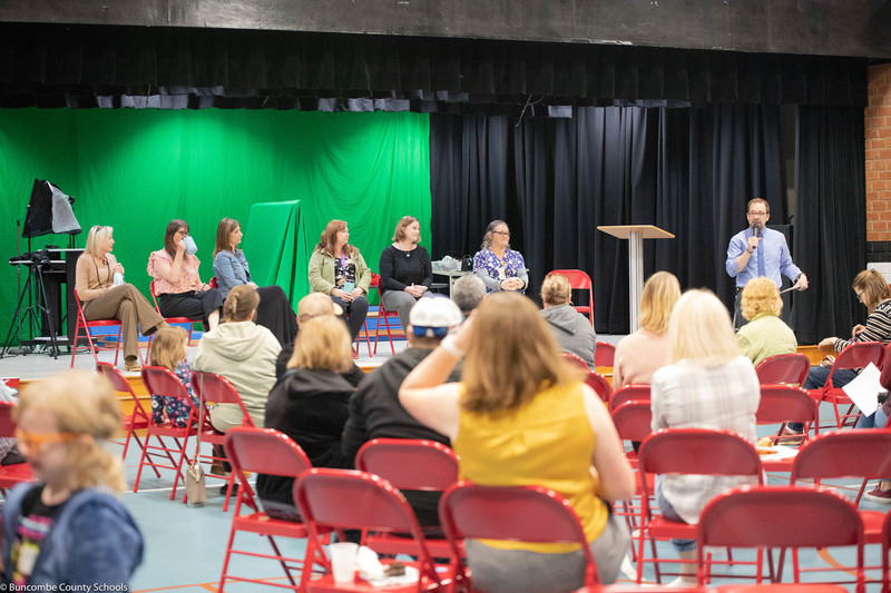 Parents listening and engaging with the panelists. 