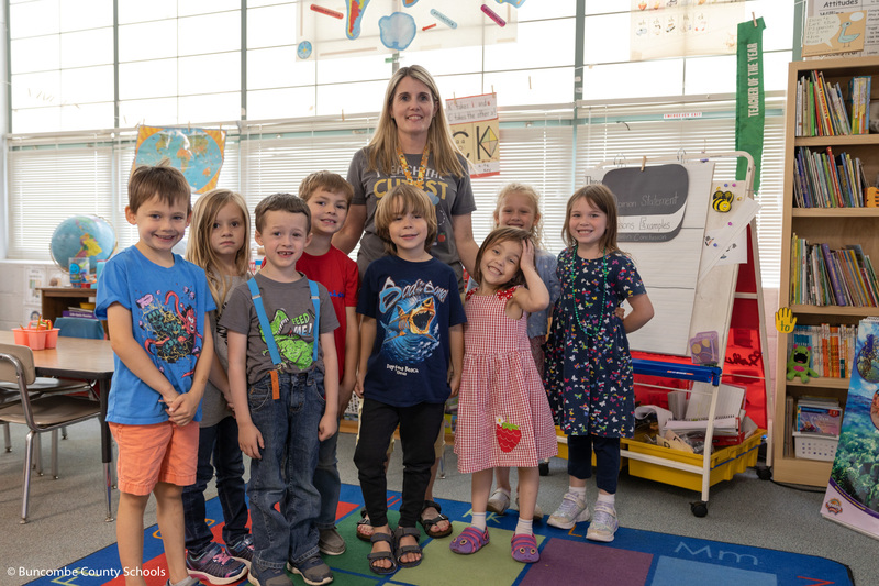 Mrs. Robinson and her students gathered together for a photo.