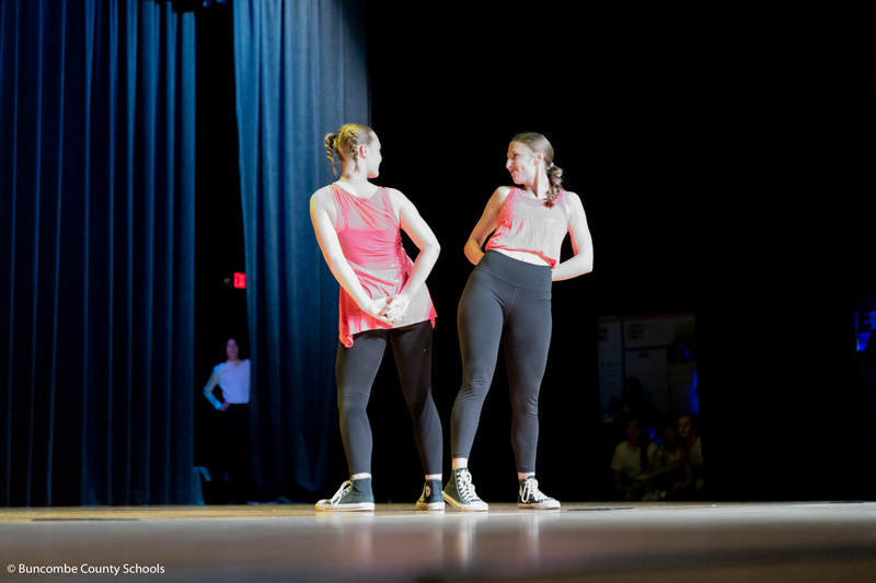 A duet performance by two student dancers.