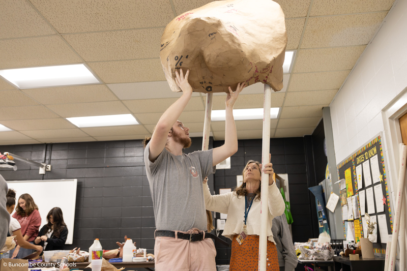 The making of a huge lion head that will be placed on PVC pipe above an actors head. 